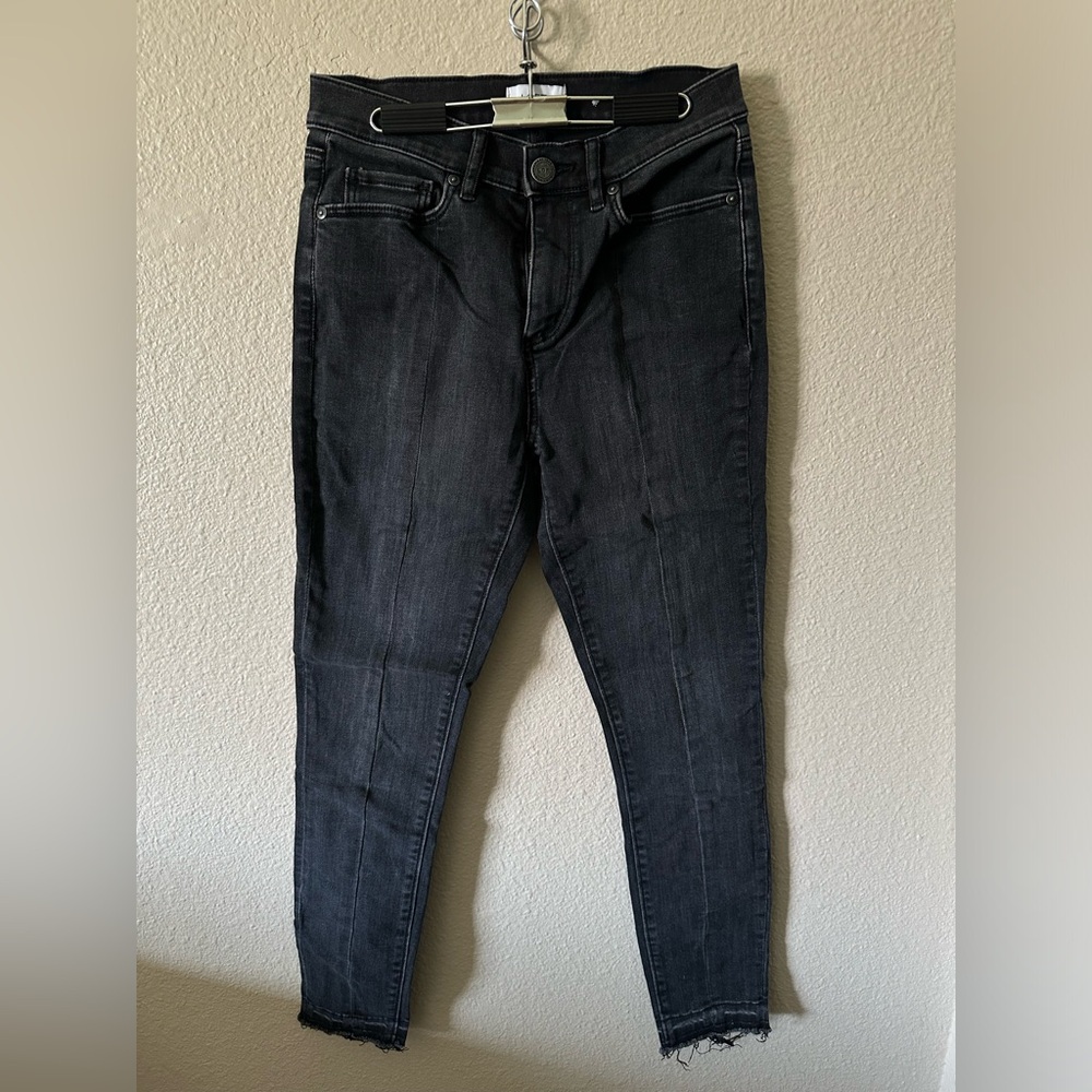 Faded black skinny jeans